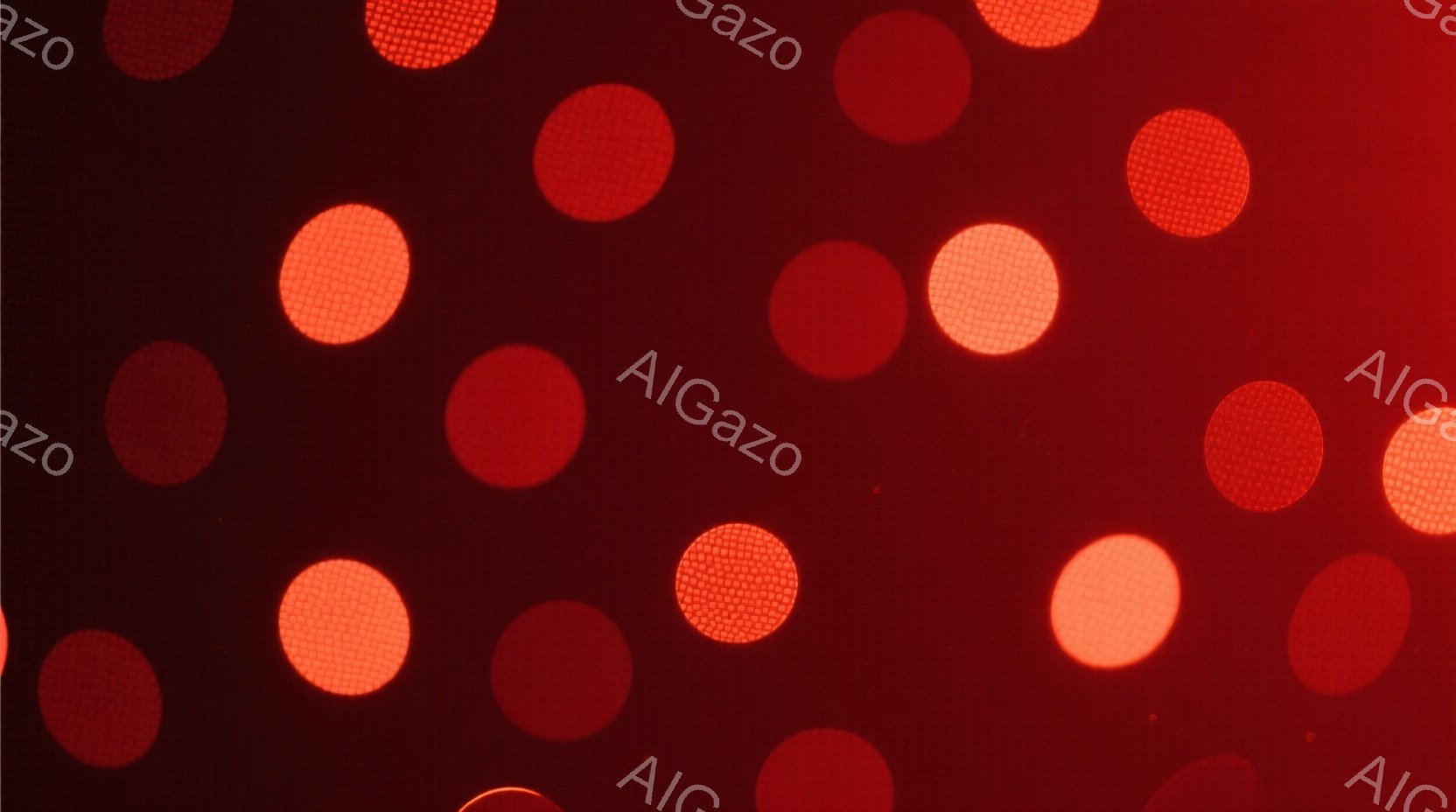 深い赤色の背景に、ぼやけたオレンジ色の円が散りばめられています。まるで舞台照明のような、または光の粒子が舞い散るような幻想的な雰囲気が漂っています。鮮やかな色彩と光の拡散が、独特の奥行きと視覚的な面白さを生み出しています。