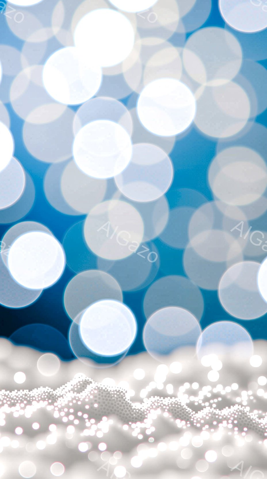 この画像は、ぼやけた光の球体が背景を埋め尽くし、下部に白い、おそらく雪のような質感の模様が広がっています。光の球体は青みがかった色合いで、まるで水中の光の反射のように見えます。全体的に幻想的で、冬の日の儚い美しさを表現したような雰囲気です。