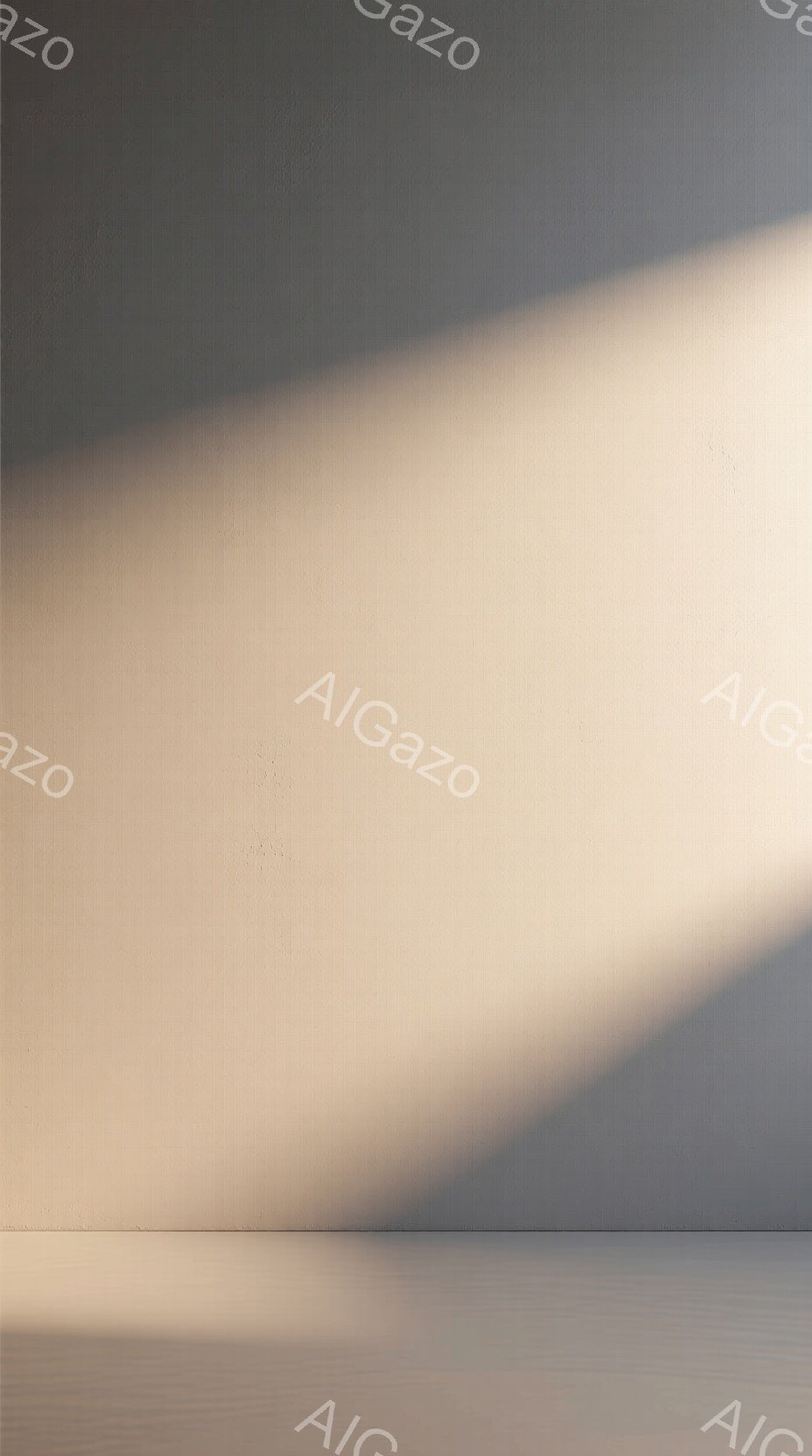 光と影が強く対比するシンプルな画像です。画面下部は影で覆われ、上部は明るい光に照らされています。背景は均一なグレーで、人物や具体的なオブジェクトは存在せず、抽象的な雰囲気を醸し出しています。