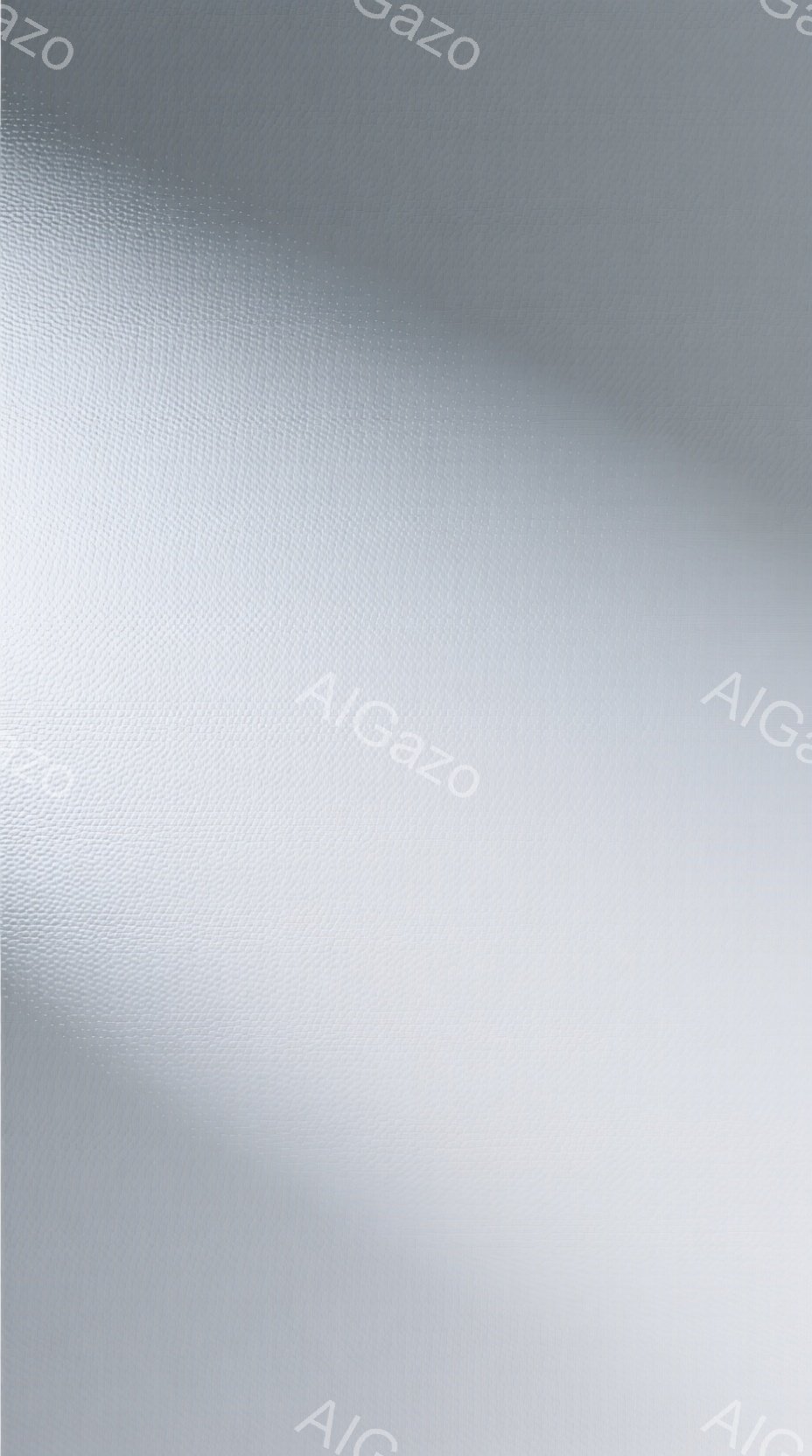 画像全体はソフトフォーカスでぼやけており、はっきりとした輪郭を持つ人物や物体は見えません。白からグレーのグラデーションが全体を覆っており、まるで霧や煙の中にいるような雰囲気を醸し出しています。細部がぼやけているため、具体的な場所や状況は特定できませんが、穏やかで神秘的な印象を与えます。