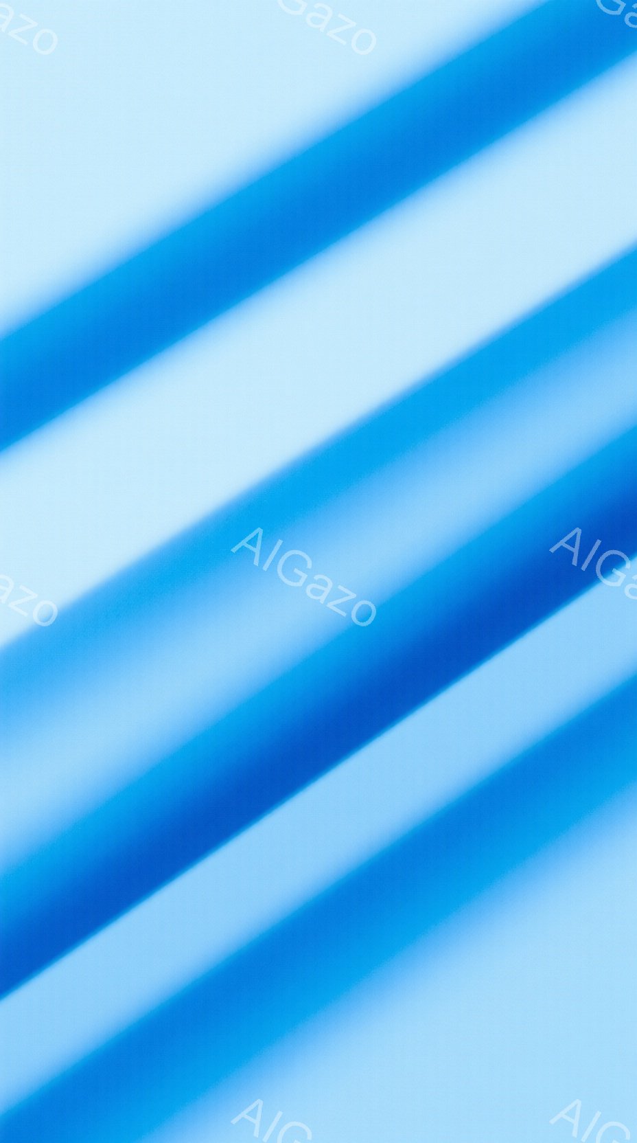 この画像は、青色のぼやけた線が複数、対角線状に走っている抽象的な表現です。鮮やかな青色が背景全体を覆い、まるで動きのあるエネルギーを感じさせます。明確な形や対象物はなく、視覚的なインパクトと色彩のハーモニーが際立っています。