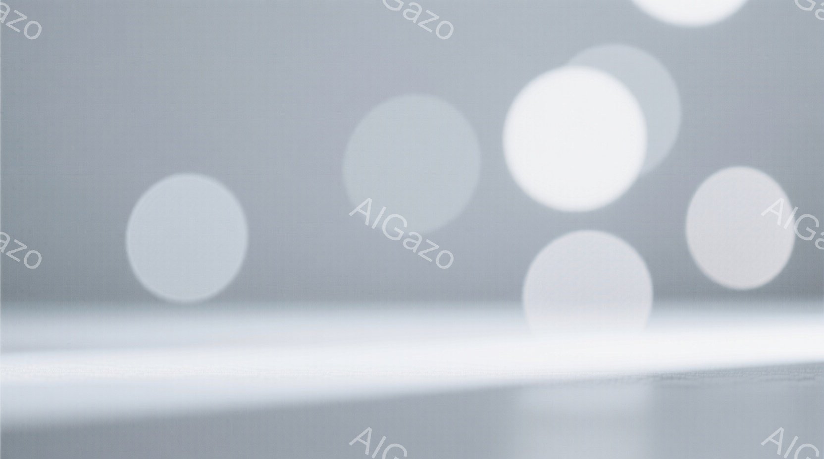 この画像はぼやけた背景を持つ抽象的な構成です。前景には水平な白い線が走り、背景には様々な大きさの白い円が散りばめられています。全体的に、柔らかく夢幻的な雰囲気を持ち、焦点のぼやけが奥行きと神秘性を強調しています。