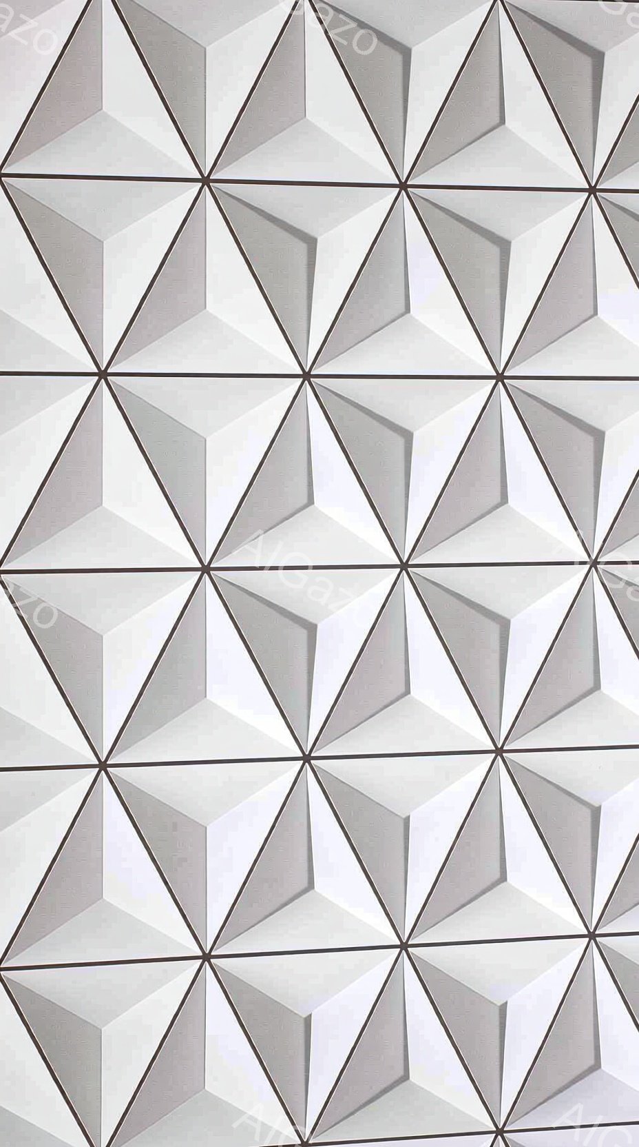 この画像は、幾何学的な三角形のパターンが繰り返されるテクスチャです。各三角形は、影と光のコントラストによって立体的に表現され、まるで彫刻のような奥行きを感じさせます。全体的に落ち着いたグレーの色調で、 - AI生成フリー素材