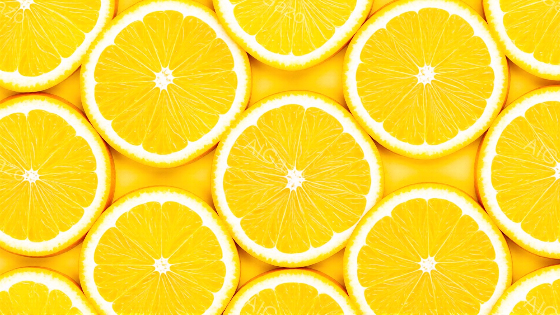 画像は、鮮やかなオレンジのスライスが密集して配置されたクローズアップです。オレンジは均等に切り取られ、果肉のジューシーな質感が強調されています。背景はオレンジのスライスで埋め尽くされており、全体的に明るく、活気に満ちた印象を与えます。