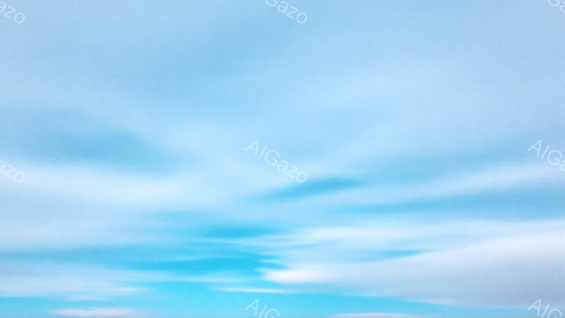空全体が明るい水色と白の雲で覆われています。雲はまるで筆で描いたような、流れるような模様を描き、光が強く反射して幻想的な雰囲気を醸し出しています。青空と雲のコントラストが美しく、穏やかで平和な空模様です。