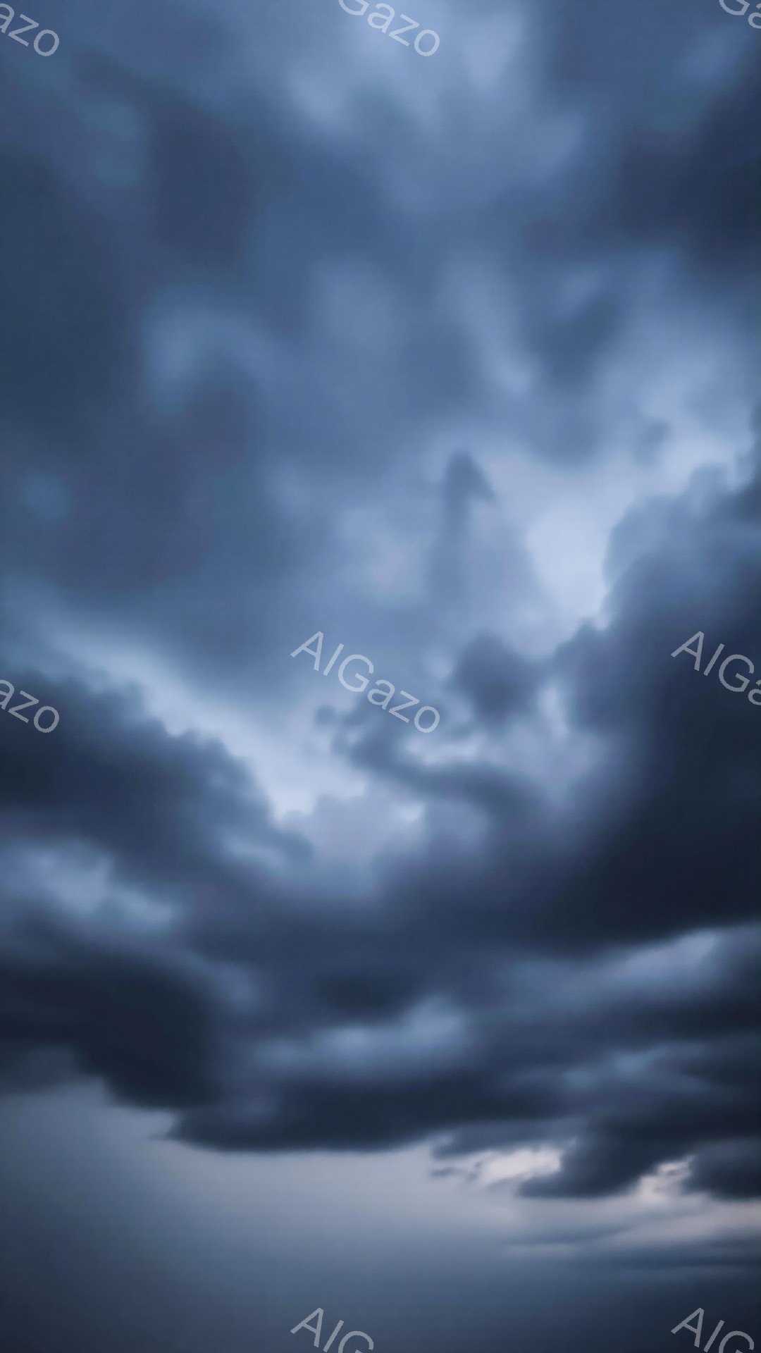 暗い灰色の雲が空を覆い、重苦しい雰囲気を醸し出しています。雲の形は不規則で、まるで巨大な波のようです。下部には、わずかに薄い地平線が見え、雲の暗さと対照をなしています。 - AI生成フリー素材