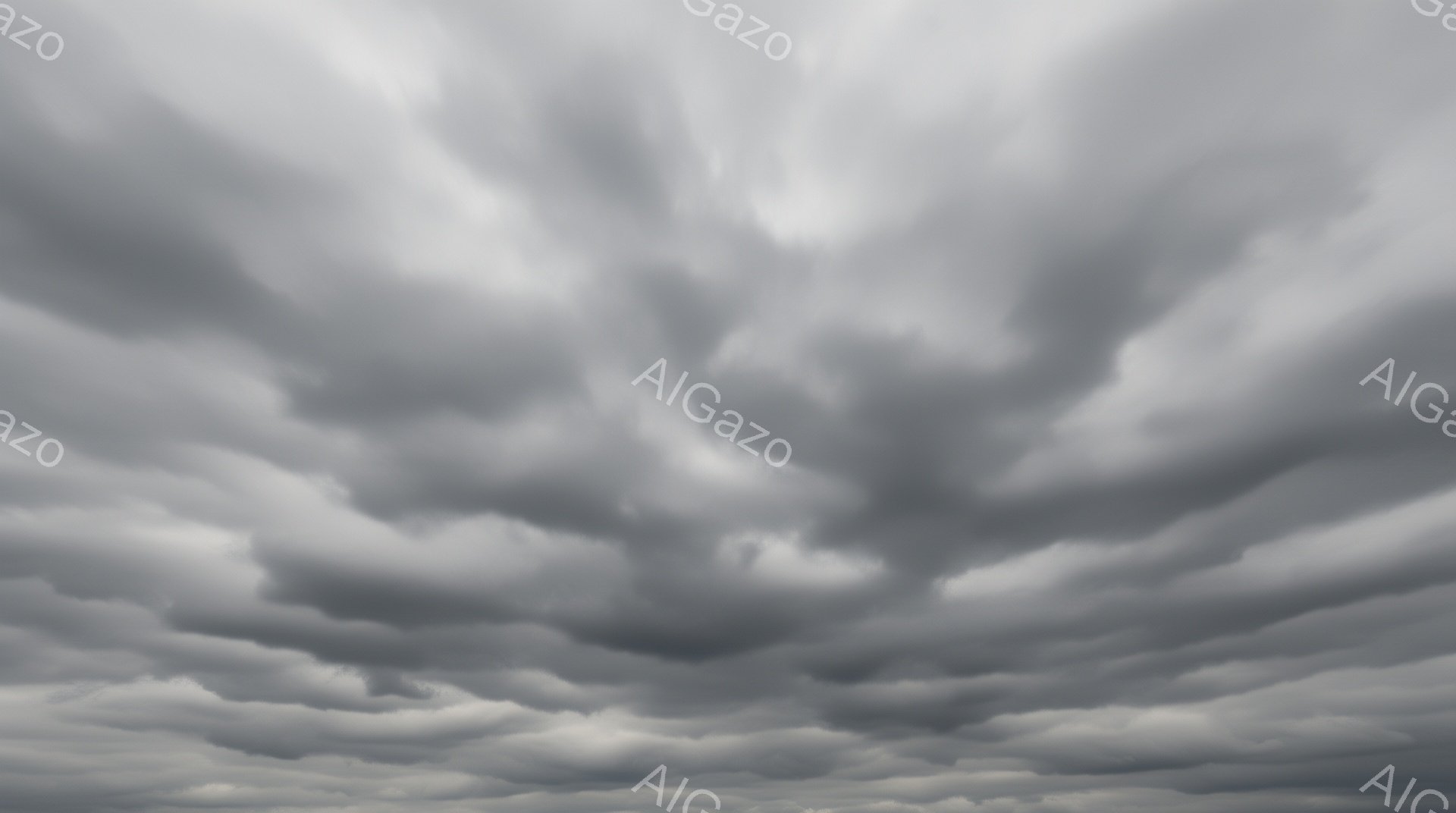 雲が空一面に広がり、まるで波のような独特の模様を描いています。厚い灰色の雲は重厚感があり、これから雨が降りそうなおどろおどろしい雰囲気を感じさせます。雲の形は、光と影によって強調され、ドラマチックな空の風景を作り出しています。