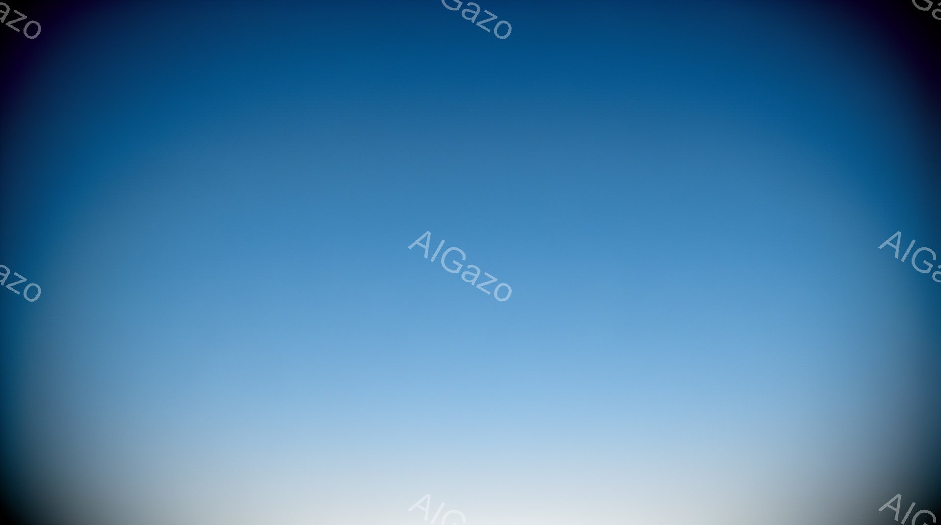 画像は、上部が白く、下部が濃い青色へのグラデーションで構成されています。特定の物体や人物は存在せず、空のような滑らかな色の変化が印象的です。全体的に穏やかで、静謐な雰囲気が漂います。