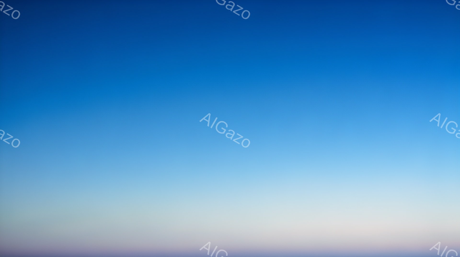 この画像は、グラデーションで彩られた空の様子を捉えています。下部は薄い紫色からピンク色へと移り変わり、上部に向かうにつれて鮮やかな青色へと変化します。穏やかで静謐な雰囲気で、夕暮れ時や夜明け前の空を彷彿とさせます。