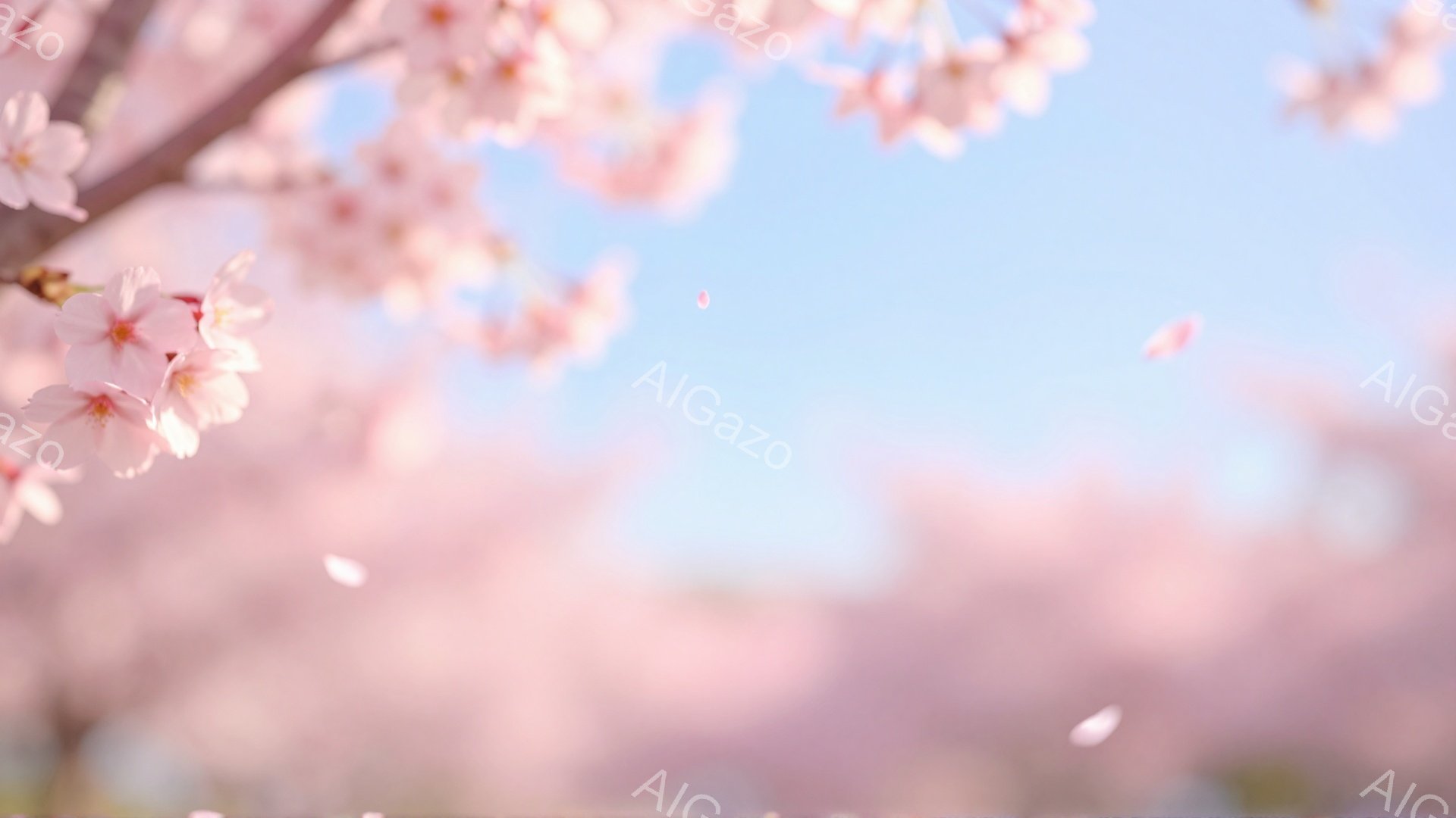 桜の花びらが舞い散る、春の穏やかな風景です。淡いピンク色の桜が背景を覆い、柔らかい光が降り注いでいます。空は明るい水色で、春の暖かさと優しさを感じさせる、夢のような雰囲気が漂っています。