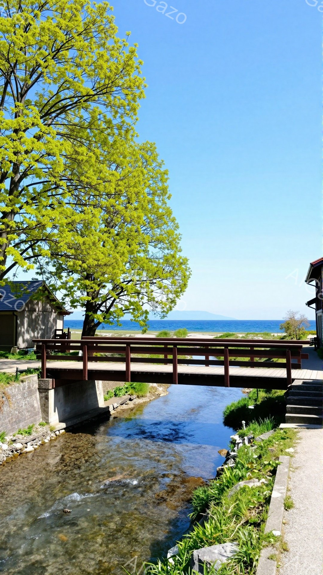 静かな小川に赤い橋がかかり、緑豊かな木々が背景に広がっています。水面は穏やかで、背景には青い湖と山々が見え、自然豊かな風景が広がっています。手入れされた道と緑が、平和で落ち着いた雰囲気を醸し出していま - AI生成フリー素材