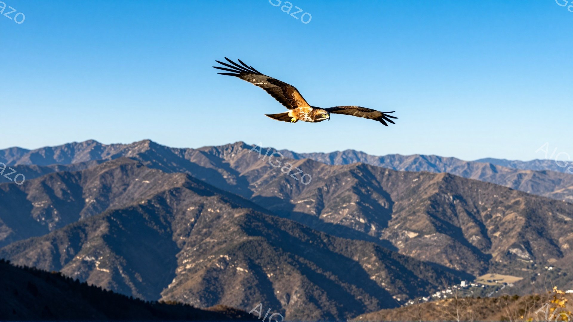 鮮やかな青空を背景に、茶色の猛禽類が翼を広げて飛び交っている。山々は霞んで遠くに見え、自然の雄大さを感じさせる。鳥の力強い翼と背景の山々のコントラストが印象的である。